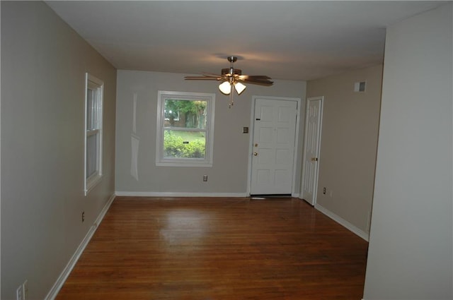 empty room featuring wood-type flooring and ceiling fan