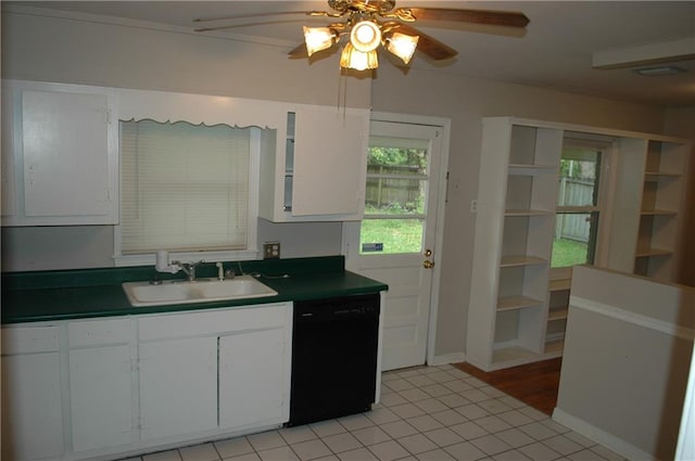 kitchen with white cabinetry, light tile patterned floors, ceiling fan, black dishwasher, and sink