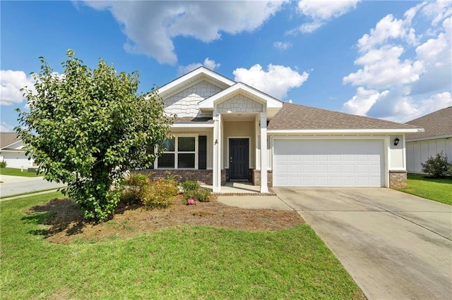 craftsman-style home featuring a garage and a front lawn