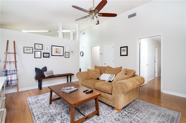 1000 Pinemont Dr, Mobile, AL 36609 - living area featuring light wood-style flooring, a ceiling fan, and high vaulted ceiling