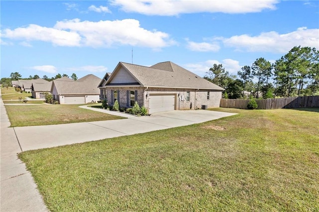 craftsman house with a garage and a front lawn