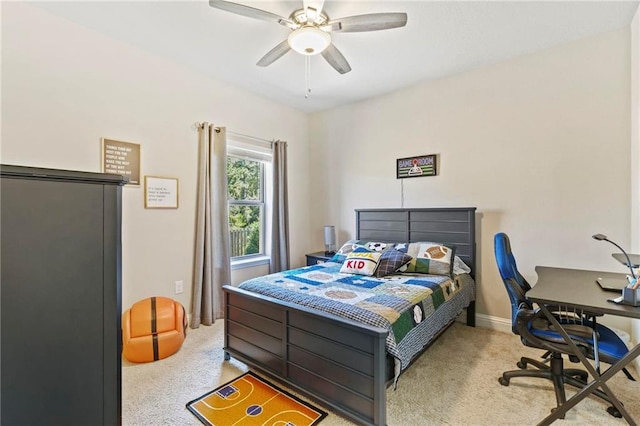 bedroom with light carpet and ceiling fan