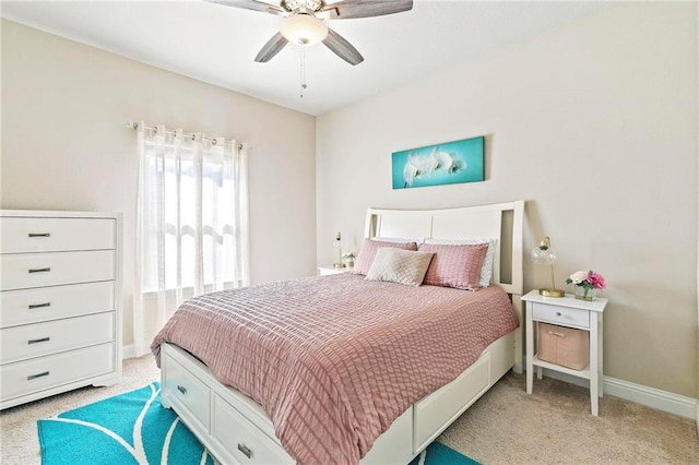 carpeted bedroom with ceiling fan