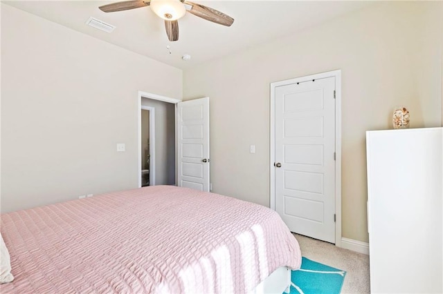 bedroom with light colored carpet and ceiling fan