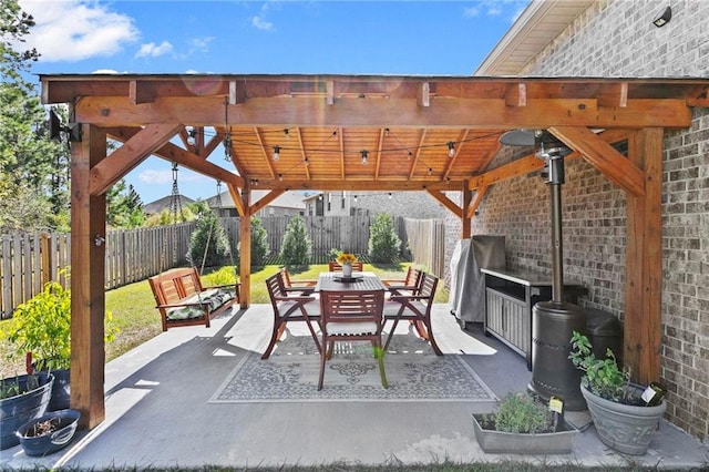 view of patio featuring a grill