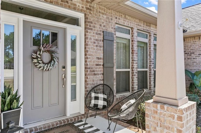 property entrance with covered porch