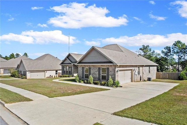 view of front of property with a garage and a front yard