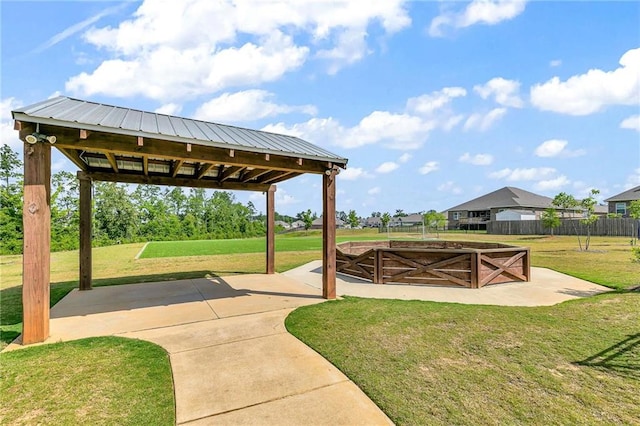 view of community featuring a gazebo and a lawn