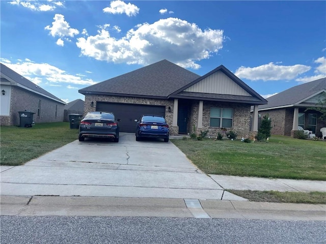 view of front of house featuring a garage and a front yard