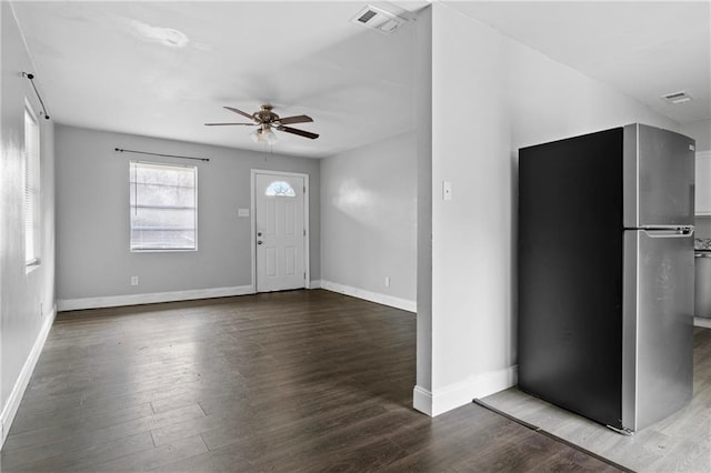 foyer featuring hardwood / wood-style flooring and ceiling fan