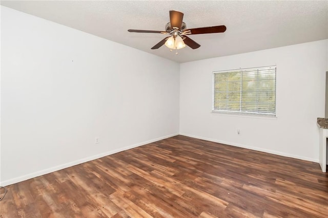 unfurnished room featuring hardwood / wood-style floors and ceiling fan