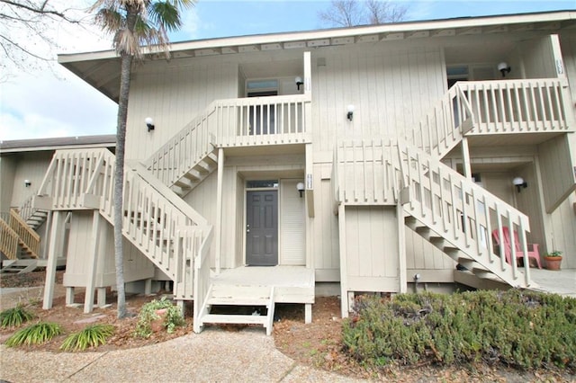 view of building exterior with stairs