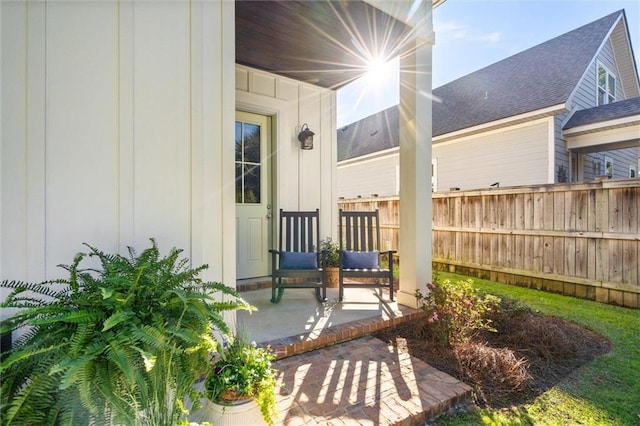 view of patio featuring fence