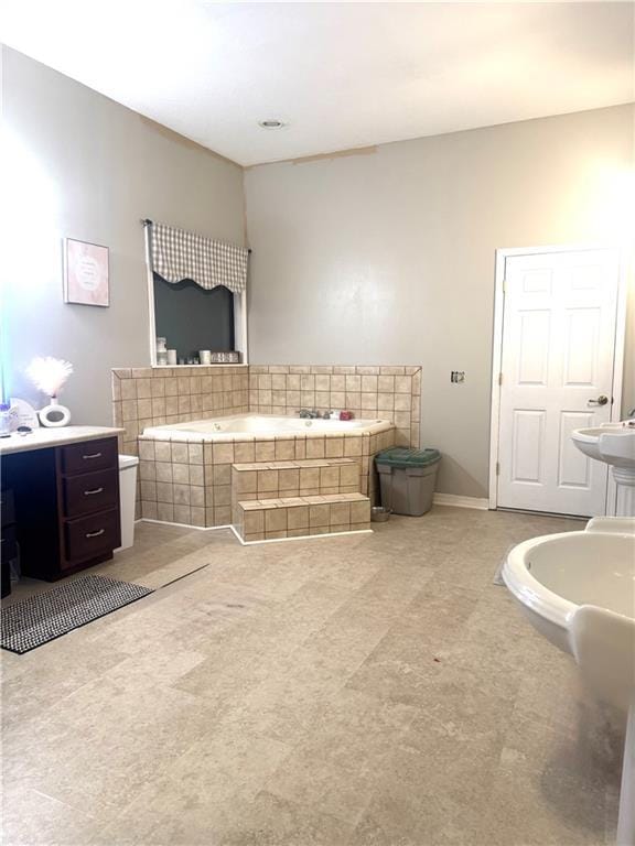 bathroom featuring a relaxing tiled tub