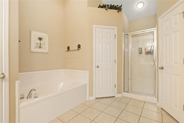 8719 Leven Ct, Mobile, AL 36695 - bathroom with tile patterned flooring, a stall shower, and a bath