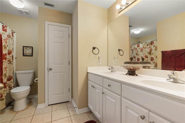 8719 Leven Ct, Mobile, AL 36695 - full bath featuring double vanity and tile patterned floors