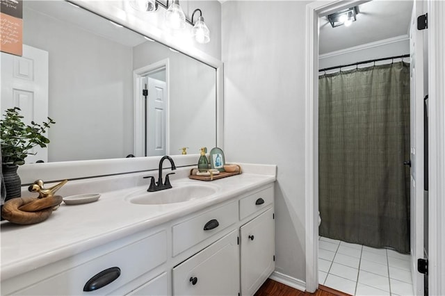 4250 Tara Dr W, Mobile, AL 36619 - bathroom with vanity, curtained shower, crown molding, and wood finished floors