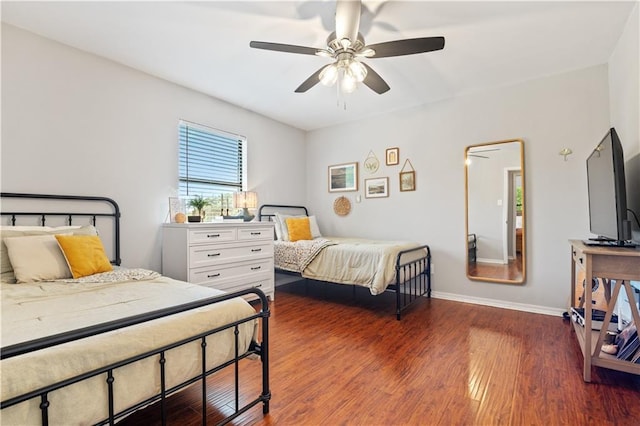 4250 Tara Dr W, Mobile, AL 36619 - bedroom with wood finished floors, baseboards, and ceiling fan