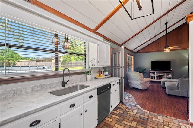 4250 Tara Dr W, Mobile, AL 36619 - kitchen featuring dishwasher, a sink, vaulted ceiling, open floor plan, and white cabinetry