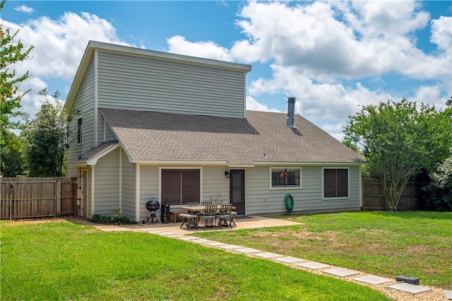 4250 Tara Dr W, Mobile, AL 36619 - back of property featuring a shingled roof and a patio