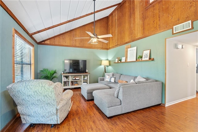 4250 Tara Dr W, Mobile, AL 36619 - living room featuring wood finished floors, ceiling fan, baseboards, and high vaulted ceiling