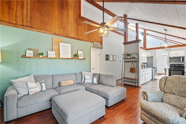 4250 Tara Dr W, Mobile, AL 36619 - living area with ceiling fan, wood finished floors, high vaulted ceiling, and wood ceiling with exposed beams