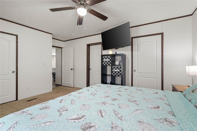 8801 Jack Williams Rd, Wilmer, AL 36587 - bedroom featuring carpet flooring, ornamental molding, and a ceiling fan