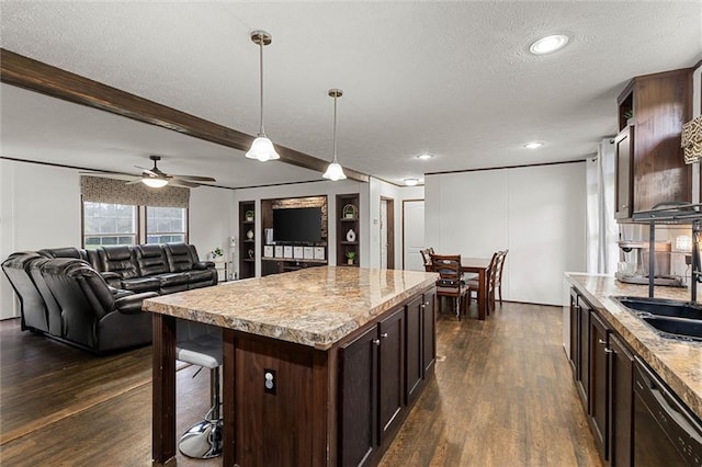 8801 Jack Williams Rd, Wilmer, AL 36587 - kitchen with black dishwasher, dark brown cabinets, dark wood-type flooring, a textured ceiling, and decorative light fixtures