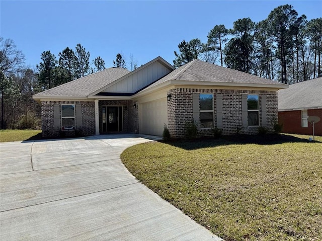 single story home featuring concrete driveway, brick siding, an attached garage, and a front yard