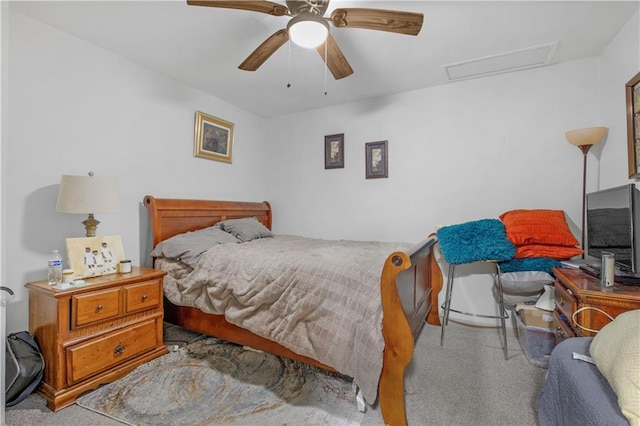 bedroom with light colored carpet and ceiling fan