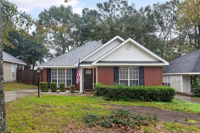 view of front facade with a front yard