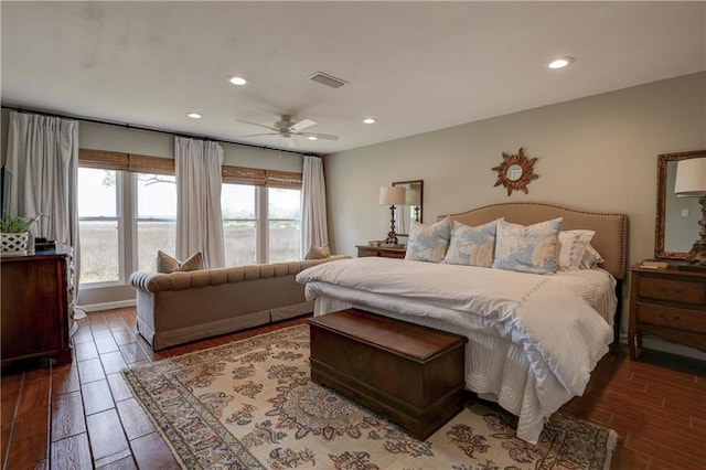 bedroom featuring ceiling fan and dark hardwood / wood-style flooring