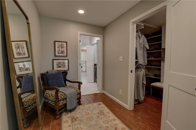 living area with hardwood / wood-style flooring