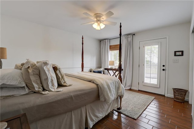 bedroom with ceiling fan, access to outside, and dark hardwood / wood-style floors