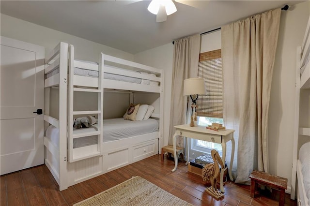 bedroom featuring ceiling fan and dark hardwood / wood-style flooring