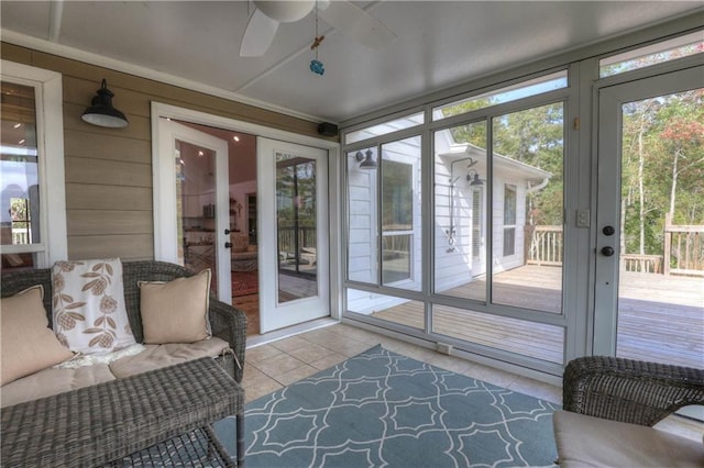 sunroom / solarium with ceiling fan