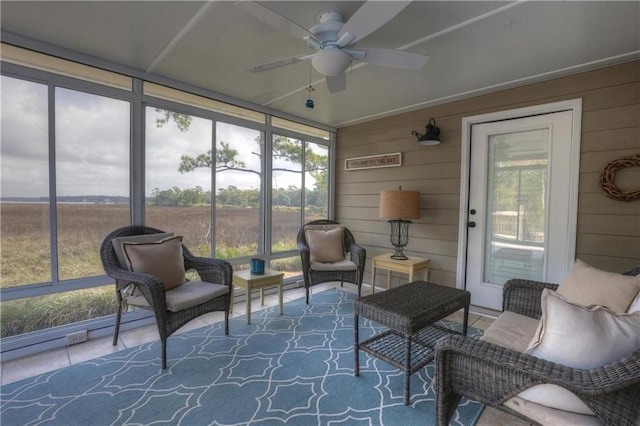 sunroom / solarium with ceiling fan