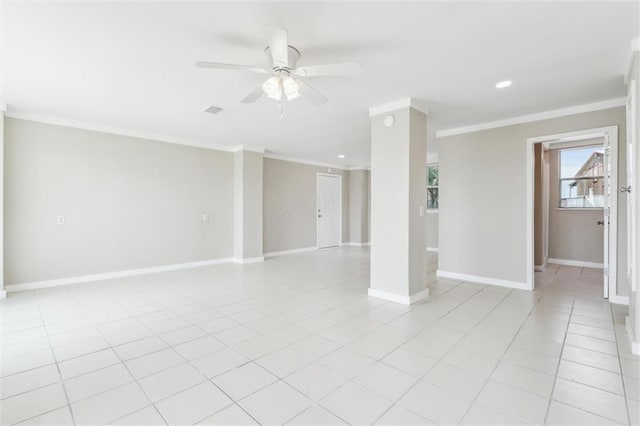 tiled empty room featuring ceiling fan and ornamental molding