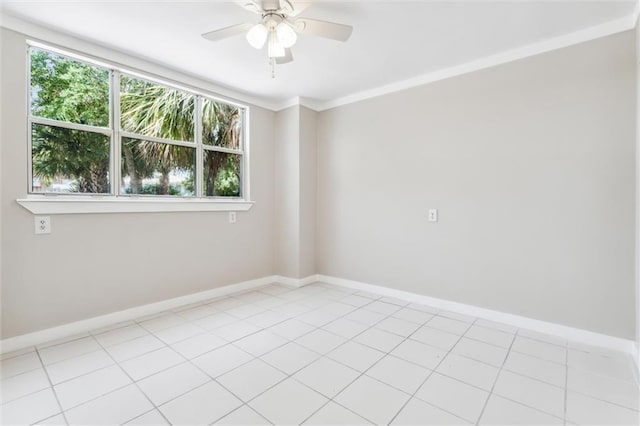 unfurnished room featuring ceiling fan and ornamental molding