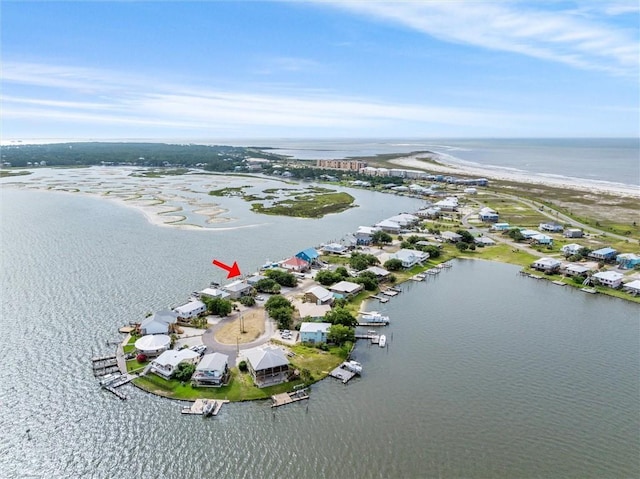 bird's eye view with a water view