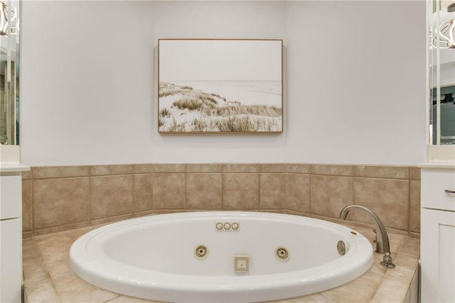612 Lost Key Dr Unit 205B, Pensacola, FL 32507 - bathroom featuring a whirlpool tub and vanity