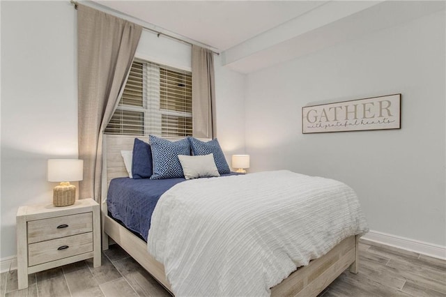 bedroom featuring hardwood / wood-style floors