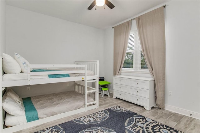 612 Lost Key Dr Unit 205B, Pensacola, FL 32507 - bedroom with light wood finished floors, baseboards, and ceiling fan