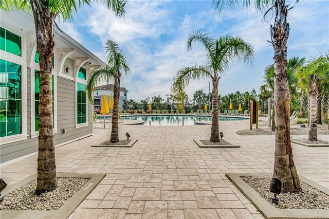 612 Lost Key Dr Unit 205B, Pensacola, FL 32507 - community pool with a patio area