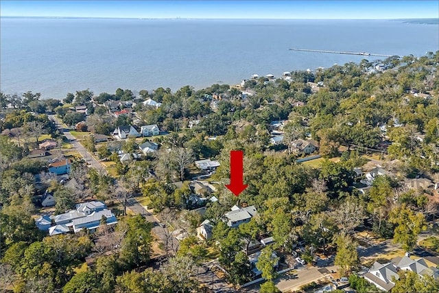 birds eye view of property featuring a residential view and a water view