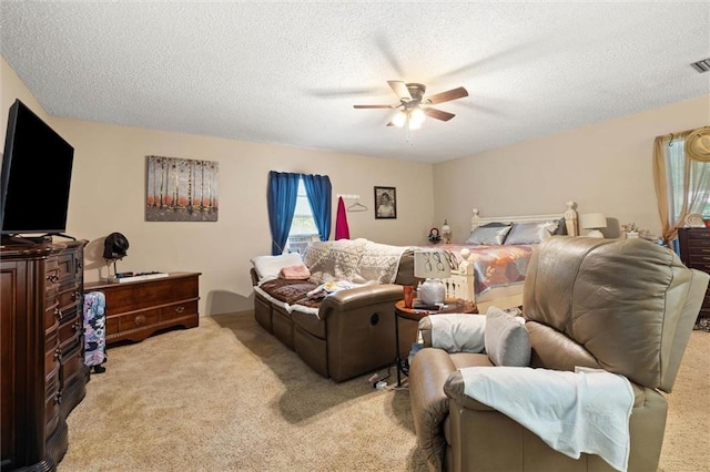 3765 Rabbit Creek Ct, Theodore, AL 36582 - bedroom featuring light colored carpet, multiple windows, a textured ceiling, and ceiling fan