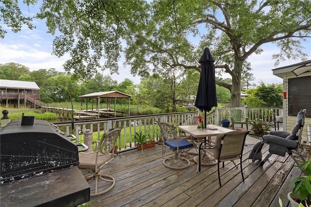 3765 Rabbit Creek Ct, Theodore, AL 36582 - wooden deck featuring outdoor dining space and grilling area