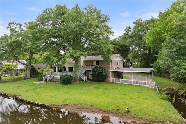 3765 Rabbit Creek Ct, Theodore, AL 36582 - rear view of property with stairs, a water view, and brick siding