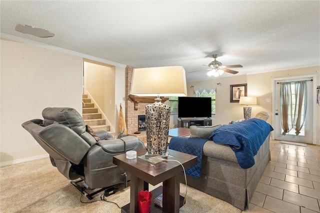 3765 Rabbit Creek Ct, Theodore, AL 36582 - living room with a textured ceiling, stairs, ornamental molding, a fireplace, and ceiling fan