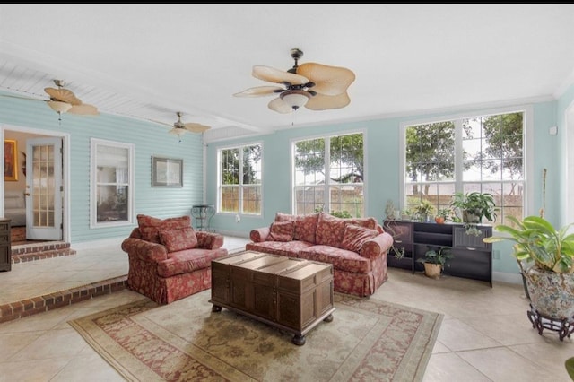 sunroom / solarium with ceiling fan